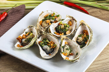 Baked oysters with green onion