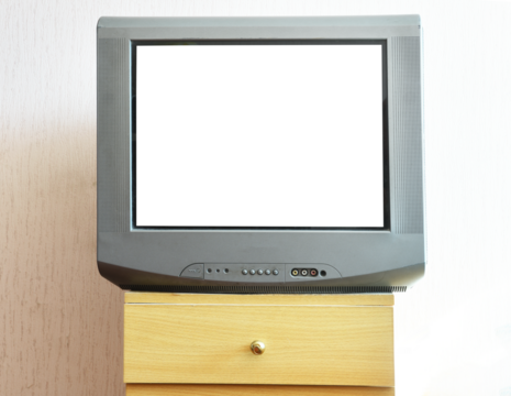 Antique TV with white screen on antique wooden cabinet, vintage design in 2000s and 90s style house.