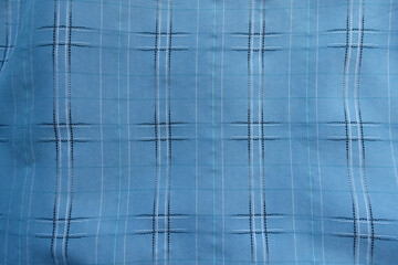 View of sky blue checkered modal fabric from above