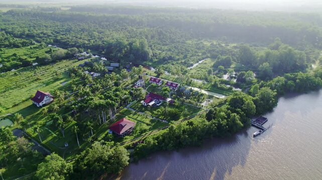 Drone fly over commewijne river, view of Frederiksdorp, Suriname