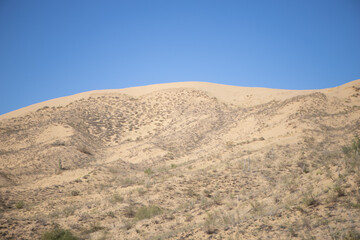Mountains of sand in the desert. Dagestan, the Caucasus