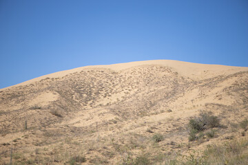 Fototapeta premium Mountains of sand in the desert. Dagestan, the Caucasus