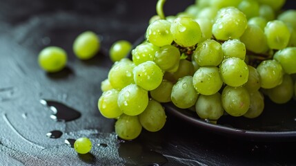 Refreshing Delicacy: Closeup of Juicy Green Grapes on a Wooden Background with Water Drops