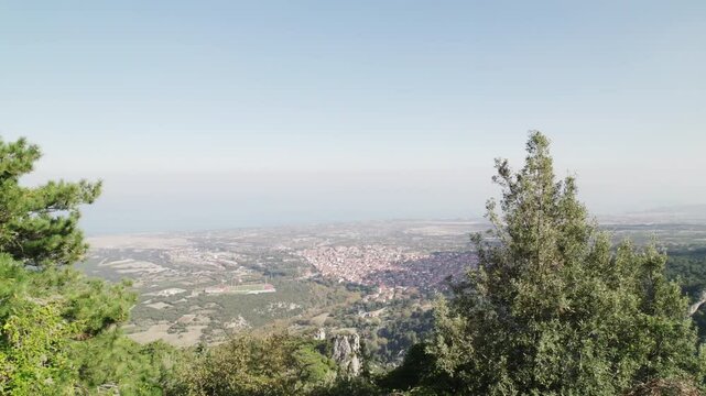 Greek town of Litochoro with small houses against the backdrop of the Mount Olympus 