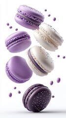 Fototapeta premium A delightful array of lavender and vanilla macarons suspended in mid-air, embellished with delicate sprinkles, creating a whimsical and elegant dessert presentation.