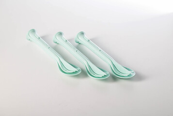 Compact set of cutlery on a white background, isolate, for trips and on the road, close-up