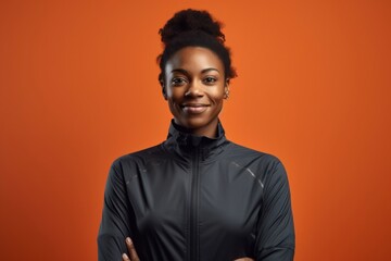 Obraz premium Black sportswoman standing portrait smile.