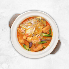 chef cook home style nyonya spicy curry grouper fish head with vegetables in big clay pot asian Chinese banquet halal seafood steamboat cafe restaurant menu