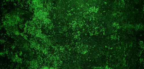 Fototapeta premium long cracked wall background in green color, Abstract background texture concrete or plaster hand made wall.