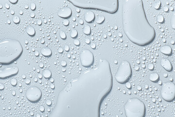 Cosmetic blue swatch of face cleansing water, tonic or wash soap foam cleansing gel background