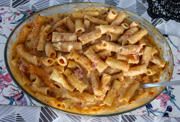 baked pasta with ham in bechamel sauce