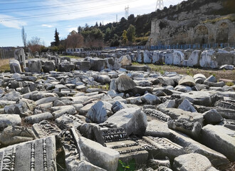 Ancient stone ruins with a pattern, fragments of ancient buildings and structures of the Roman...