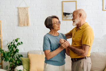 Fototapeta premium A devoted wife helps her husband with diabetes, sharing a warm moment together at home.