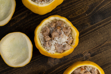 peeled and cut pumpkins on top for baking with meat and rice