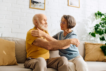 A devoted couple at home, the wife provides care and support to her husband living with diabetes.