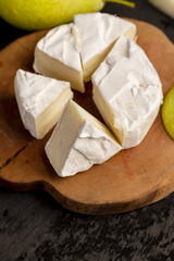 soft processed cheese with edible white mold