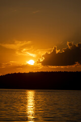 orange sky during sunset on the lake