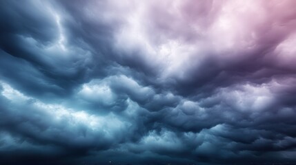 Obraz premium The sky is brimming with swirling storm clouds, casting a moody atmosphere over the land below, creating a dramatic display of nature's intensity and emotion.