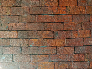 Old orange brick wall, rough surface