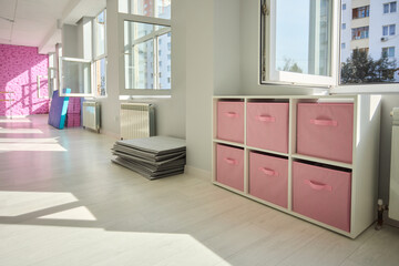 This bright studio boasts modern decor, abundant light, and a welcoming atmosphere for creativity