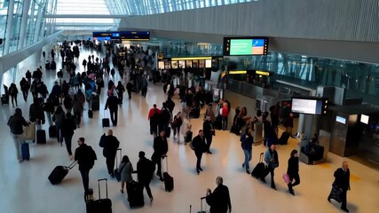 Busy Airport Terminal with Travelers and Luggage