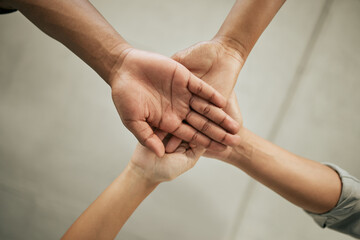 Fototapeta premium Business, people and hands together for support in office with below, unity and team building. Collaboration, employees and victory pile in celebration of company achievement, solidarity and target