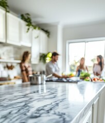Empty marble kitchen countertop with family cooking in background, product placement display space