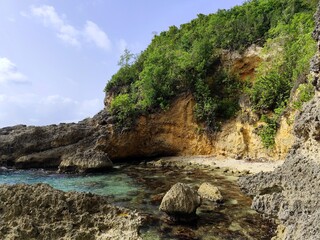 cliffs by the sea in north of Grande Terre, Anse bertrand, secret cove in guadeloupe