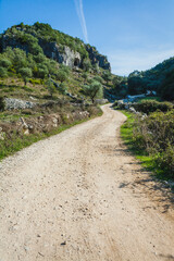 dirt path winding through a rural landscape in the Buracas do Casmilo region of Portugal