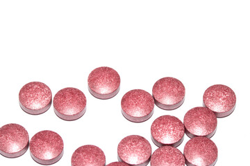 Vitamin Capsules and Pills on a White Background For Medication round and long shaped