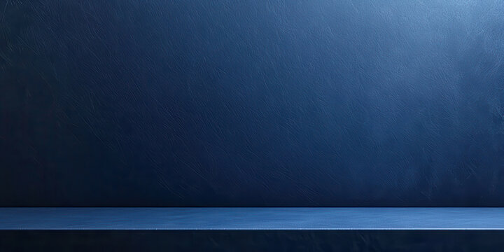 A blue wall with a blue shelf on it