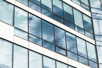 glass facade window wall modern skyscraper building business center down town district background perspective smooth surface dramatic lighting