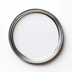 Metallic circular object with reflective surface on white background