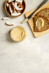 Vegan coconut butter cream with multigrain bread. Sugar and lactose free breakfast
