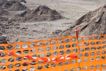 Plastic safety grid in construction site areas to delimit construction activities