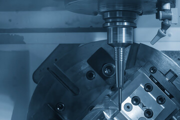 The 5-axis CNC milling machine  cutting the automotive part with solid ball nose end mill tool.