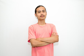 An Indonesian, Asian man wearing a pink tshirt formal style involving his partner with standing confidence like a mature person and a young businessman. isolated in white background