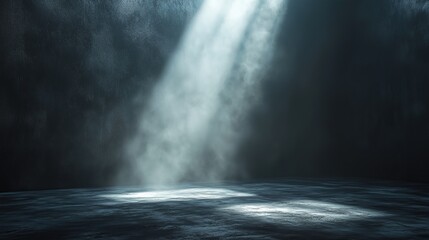 White spotlight coming from above at an angle, shining on a grey textured wall in a grunge room