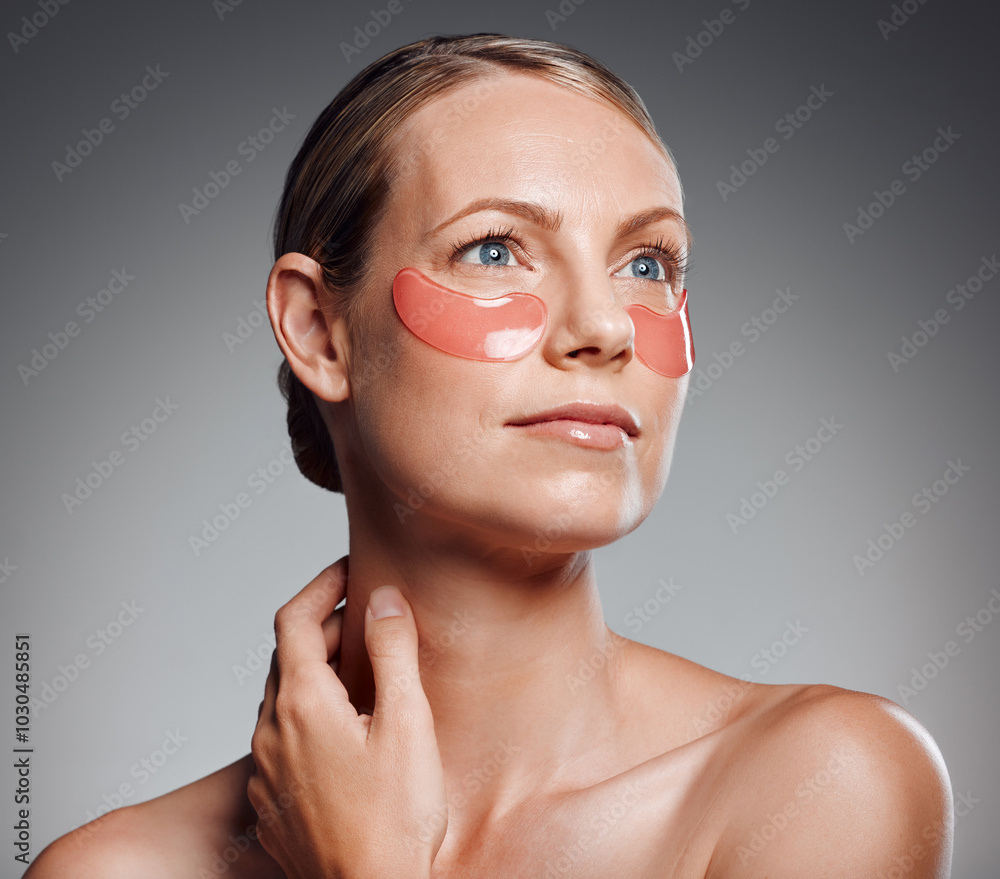 Poster Beauty, woman and eye patches for skincare, wellness or thinking of collagen treatment. Mask, model and cosmetics on face for dermatology, glow or anti aging isolated on gray studio background