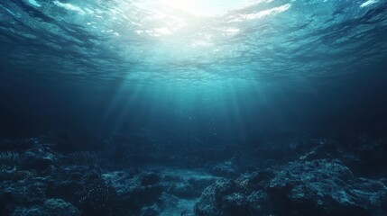 Fototapeta premium A serene underwater scene with sunlight filtering through the surface, illuminating the ocean depths and creating an ethereal atmosphere.
