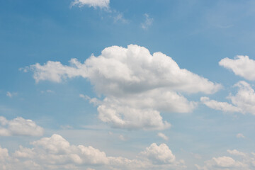Fluffy Cloud Against Blue Sky