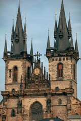 Fototapeta premium Exploring the stunning architecture of Prague's Gothic church at twilight with intricate designs and towering spires