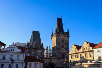 Fototapeta premium Exploring the historic architecture of Prague under a clear blue sky in the heart of the city