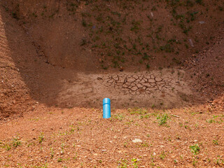 Water storage ponds are dry and cracked.