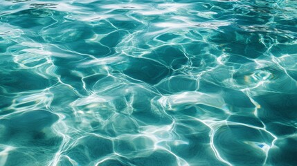 Obraz premium Green-blue ocean water with gentle ripples, natural background. 