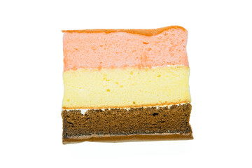 Piece of layer cake isolated on white background