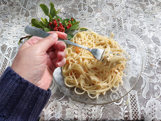 spaghetti with sauce  on the table