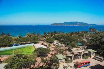 Stunning coastal view of Nha Trang Vietnam showcasing blue waters lush greenery and a clear sky