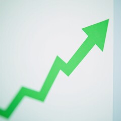 A green business-related line graph on an arrows background file format