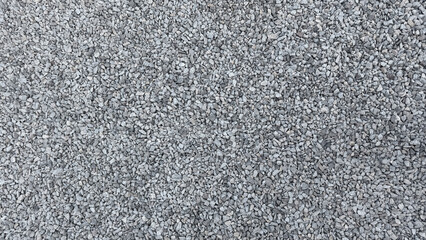 Texture from a pile of grey crushed stone.